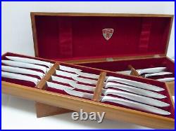 GERBER Legendary Blades carving set with 8 steak knives in a wood case. Pre-owned