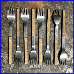 Peter Raacke Mono-t stainless and teak flatware. 1960. 76 Pieces Service For 8